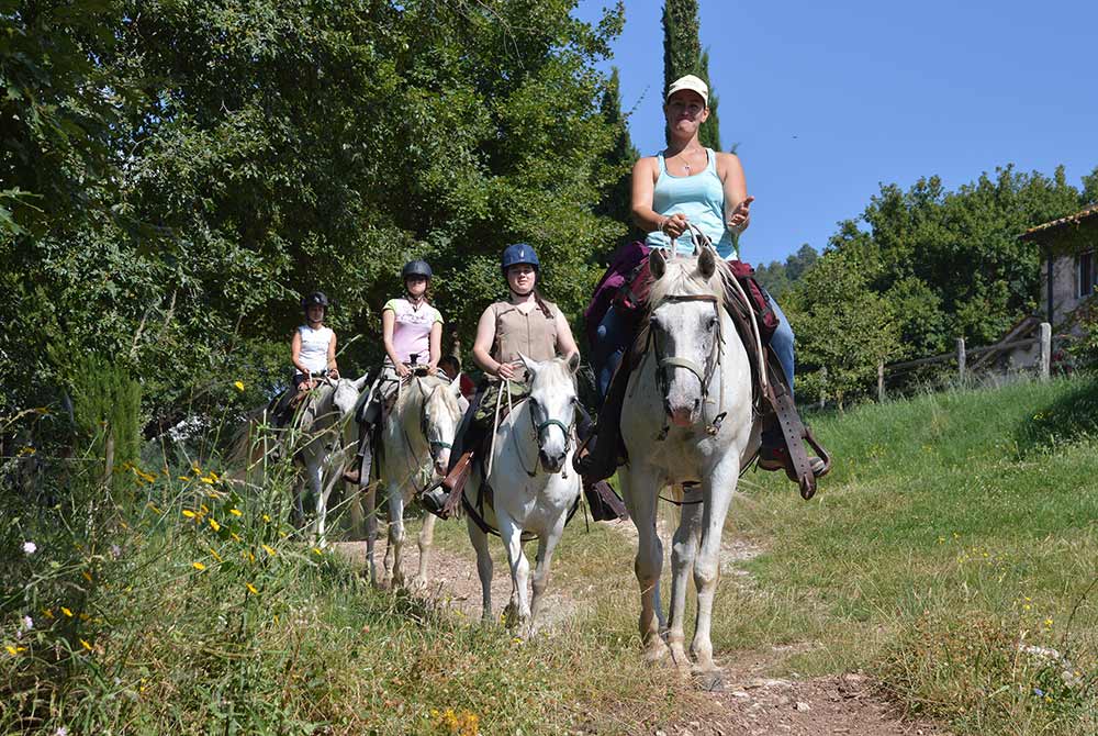 Tutta la famiglia a cavallo